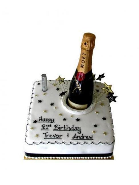 birthday cake with champagne bottle