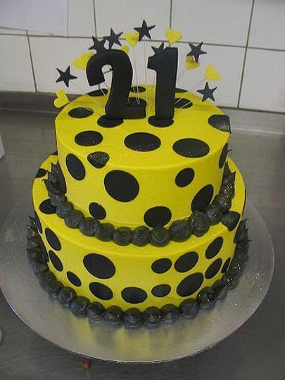 black and yellow birthday cakes