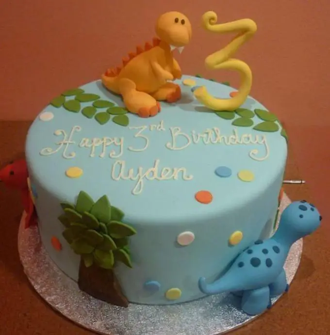blue dinosaur birthday cake