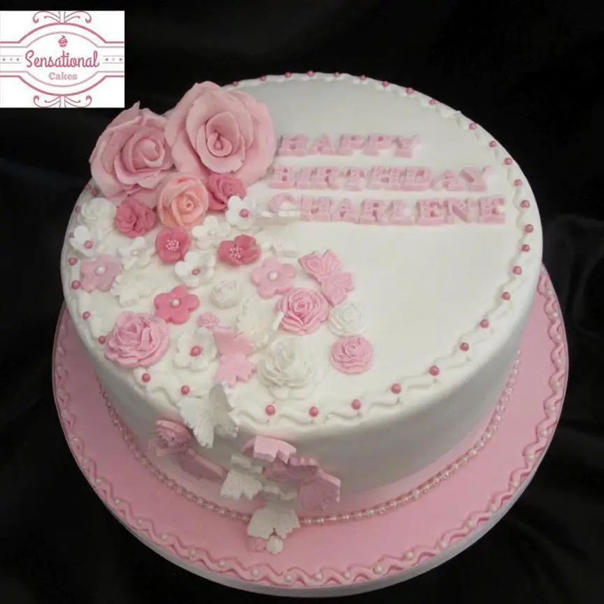 pink and white birthday cake