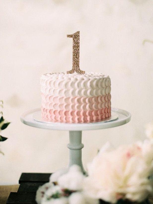 pink first birthday cake