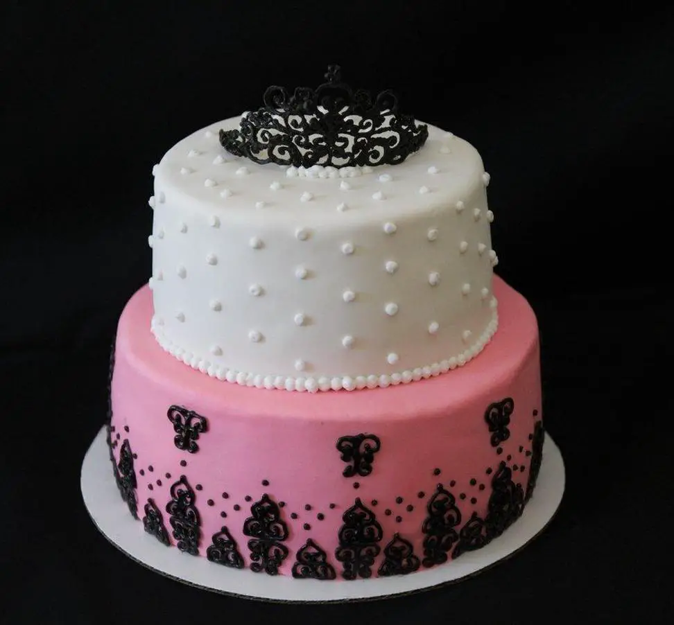 Pink white and black birthday cakes