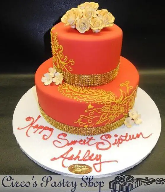 red and gold birthday cakes