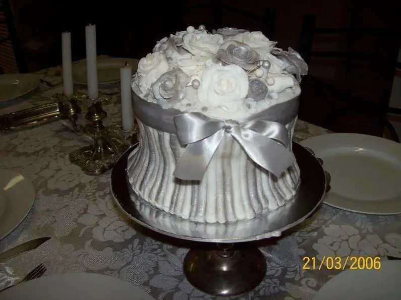silver and white birthday cakes